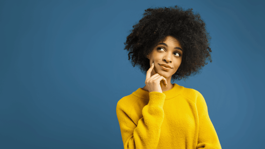 a photo of a woman wondering which one, rank math vs yoast